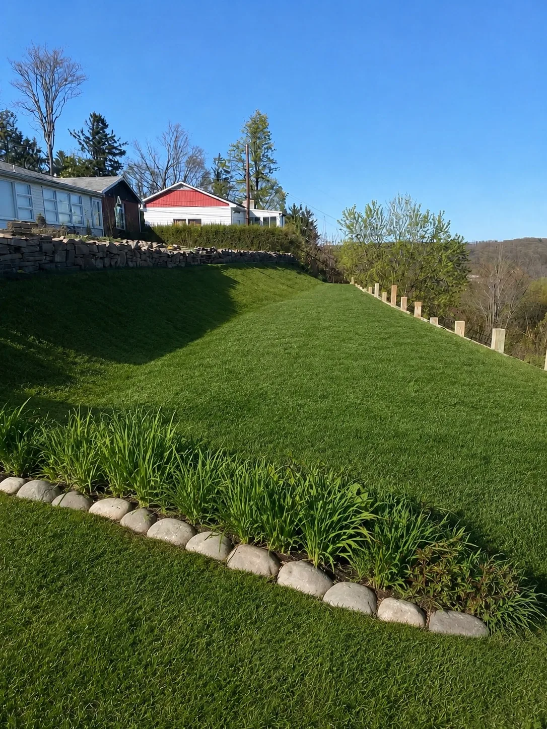After hillside landscaping project