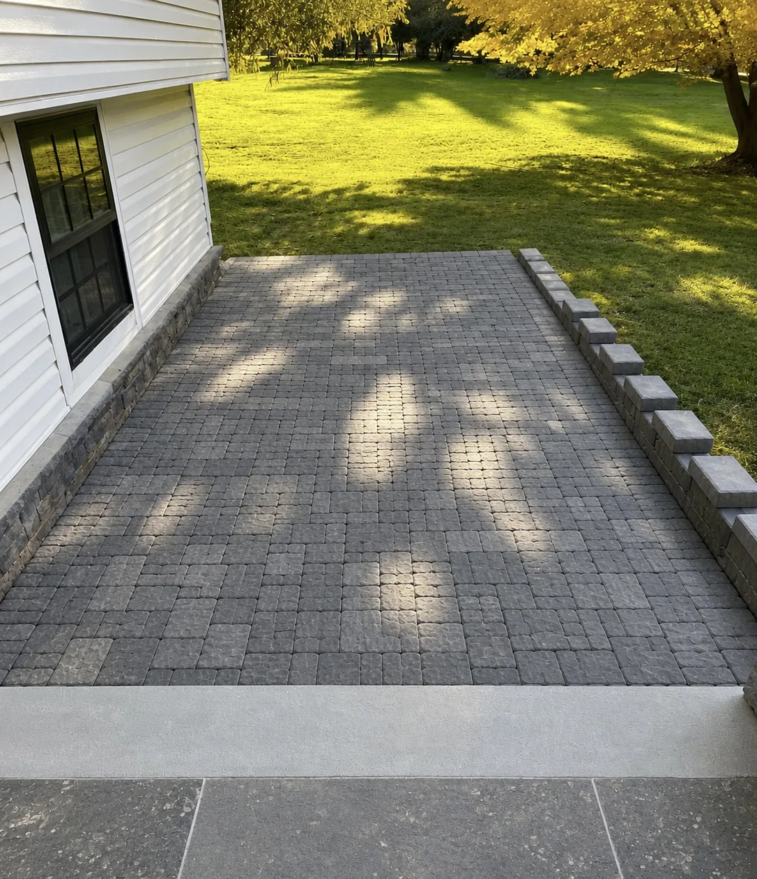 Backyard paver patio after installation in Kingston NY