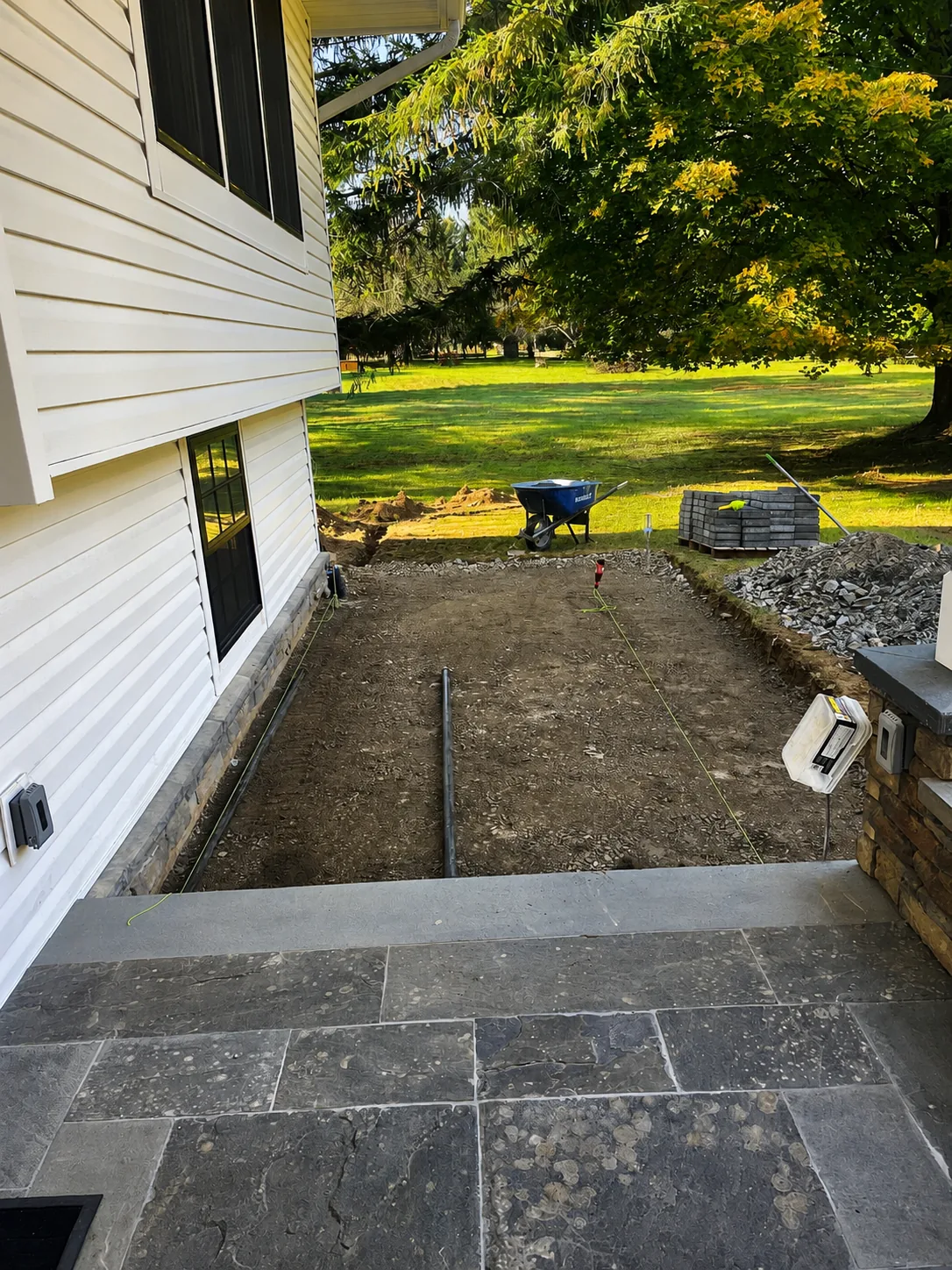 Backyard paver patio before installation in Kingston NY